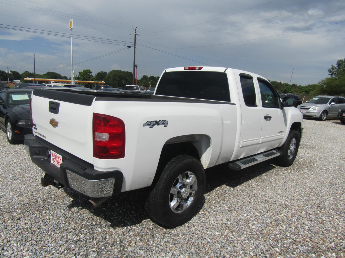 2013 White /Tan Chevrolet Silverado 2500HD LT Ext. Cab 4WD (1GC2KXCG3DZ) with an 6.0L V8 OHV 16V FFV engine, Automatic transmission, located at 15016 S Hwy 231, Midland City, AL, 36350, (334) 983-3001, 31.306210, -85.495277 - Photo#7